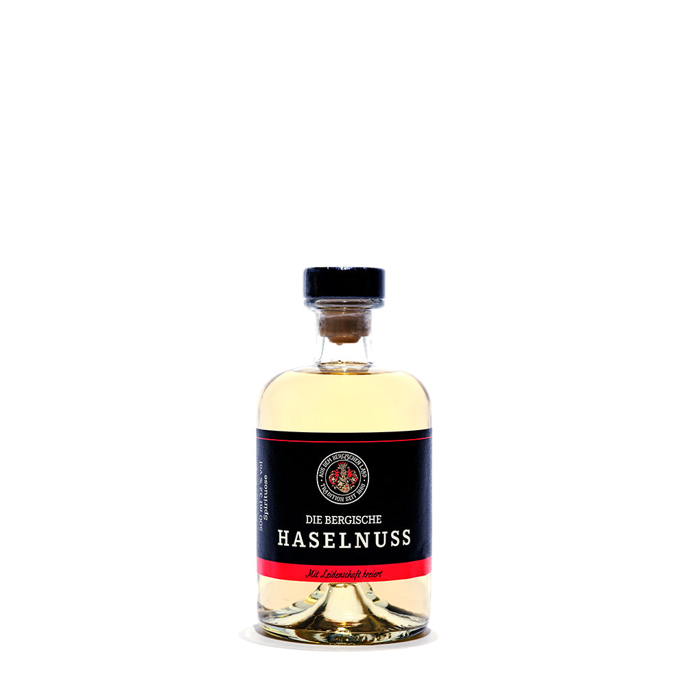 Hoffer Alter - Haselnuss -die Bergische- 32% -  500 ml - Klare Flasche Haselnusslikör 32% vol mit schwarzem Etikett und rotem Akzent, 500 ml.